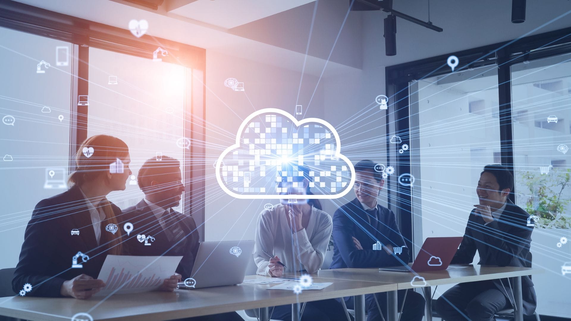 A digital image of a cloud overlay with a meeting of business professionals in the background