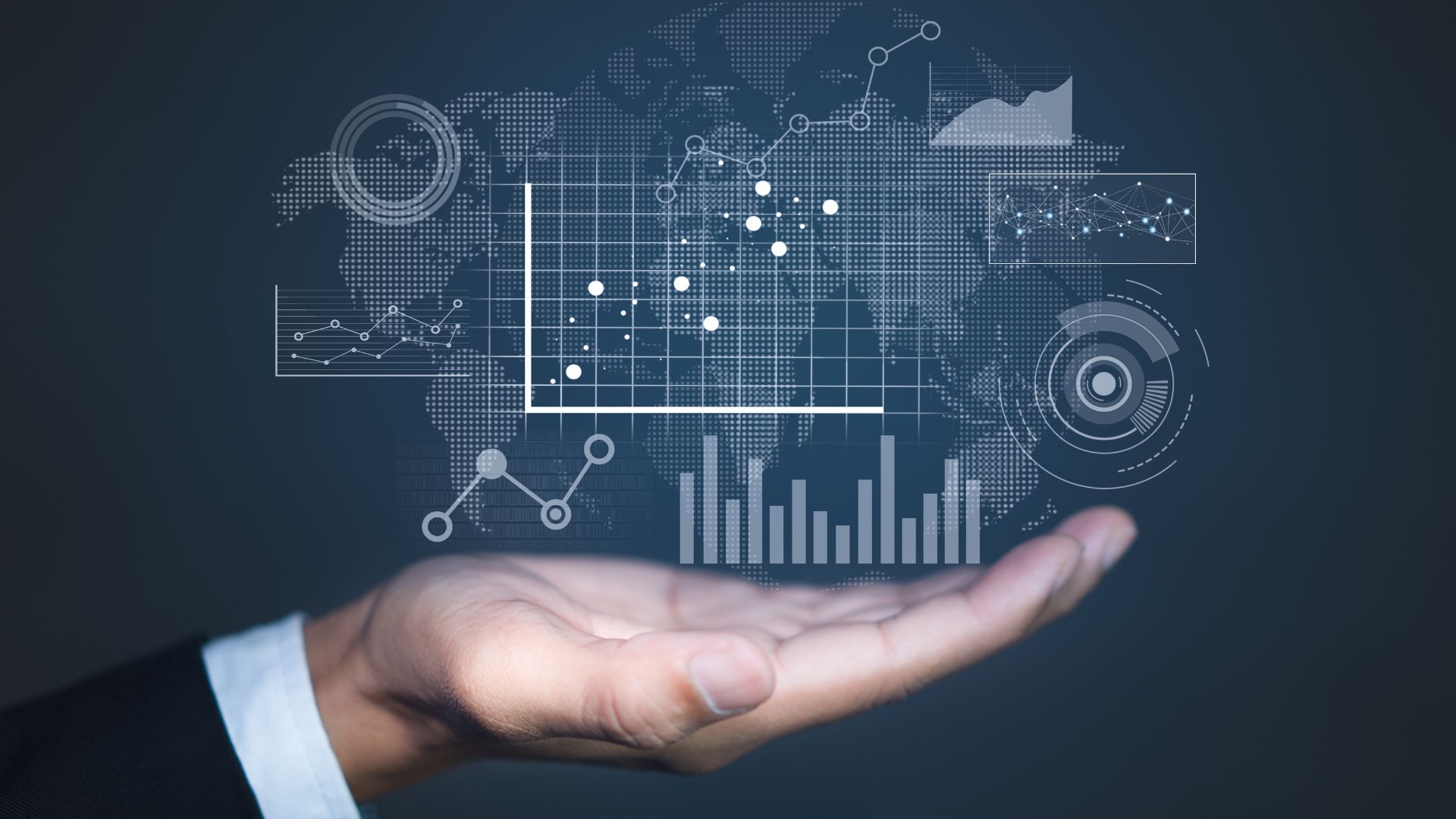 Open hand with graph and with charts and graphs above it