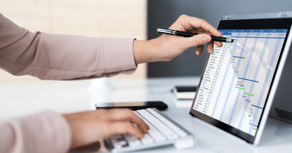 Someone using a tablet to work on spreadsheets